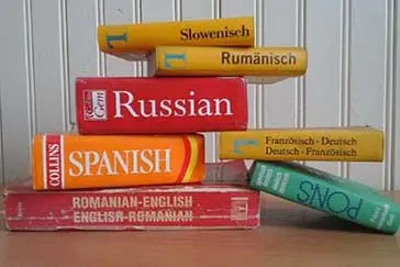 A stack of dictionaries in different languages.